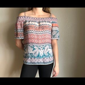 Cold shoulder Multi-colored size large blouse.